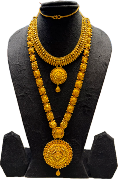 Layered gold necklace: a short collar with a round pendant and a longer chain of floral links